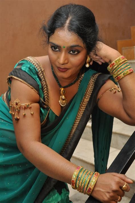 Jayavani Sexy Hot Photos In Saree At Minugurulu Audio Launch