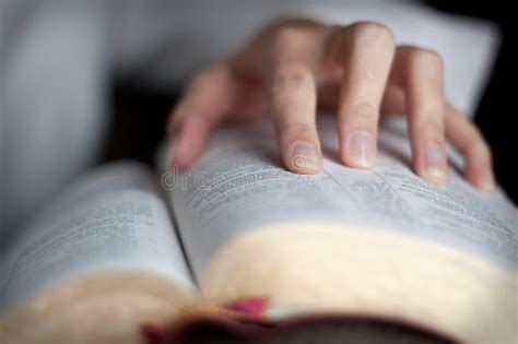 Reading A Bible With A Hand On The Bible Stock Image Image Of Woman Lifestyle 122746645