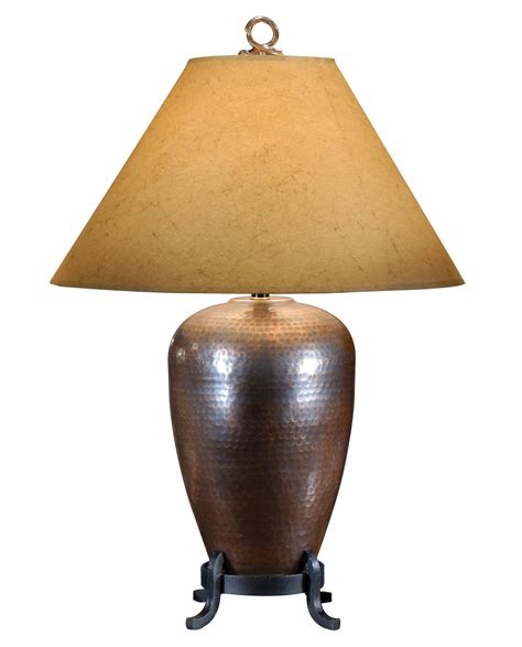 Kitchens, home offices, side tables, bedrooms and the like are all getting a makeover in terms of bursts of brilliance in all nooks and crannies. Wildwood 21093 Hammered Copper Table Lamp