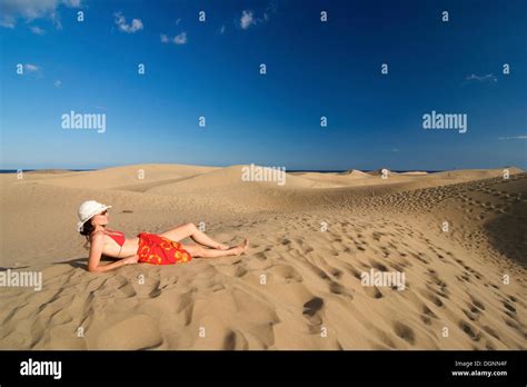Woman In Front Of Sand Dunes Of Maspalomas Gran Canaria Canary