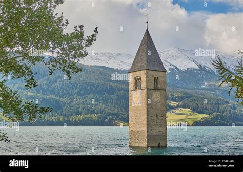 Submerged Church Tower In The Lake Reschen In Tirol Lago Di Resia With