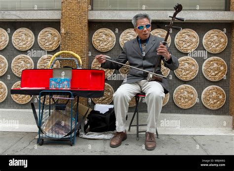 Chinese Street Musician Stock Photo Alamy