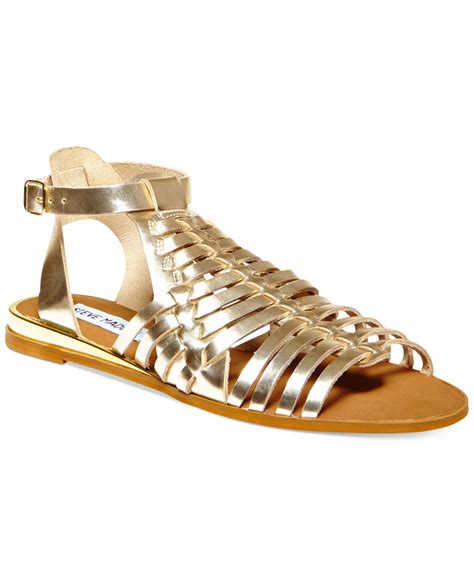 lyst steve madden women s comely flat gladiator sandals in metallic