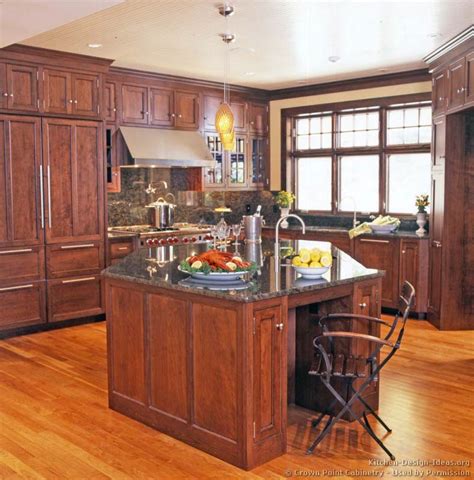 A old butcher block acts as a prep island and an early hoosier cabinet in its original finish provides storage within the main room. Victorian Kitchens Cabinets, Design Ideas, and Pictures ...