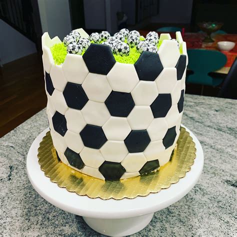 Soccer Cake Filled With Chocolate Soccer Balls Soccer Ball Cake