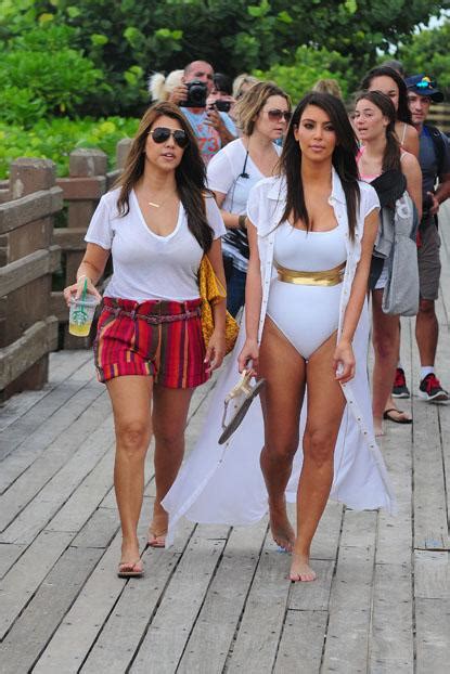 kim and kourtney kardashian sister day at miami beach