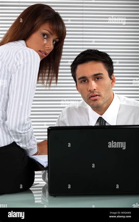 Two Eager Business People Stock Photo Alamy