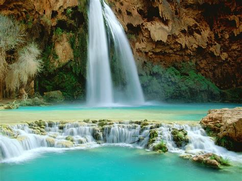 When the water flows in one direction and the rocks slope in the opposite direction you get what is known as a cascade waterfall. Beautiful Nature Pictures: Charming Waterfall