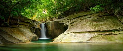 Download Wallpaper 2560x1080 Waterfall Cliff Stone Water Trees