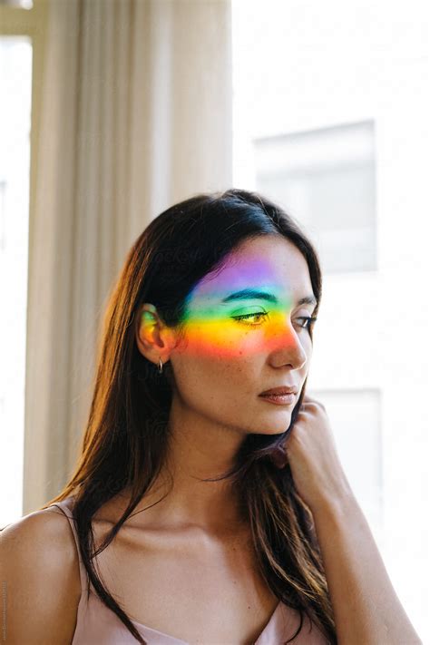 Woman In Spot Of Rainbow By Stocksy Contributor Javier Díez Stocksy