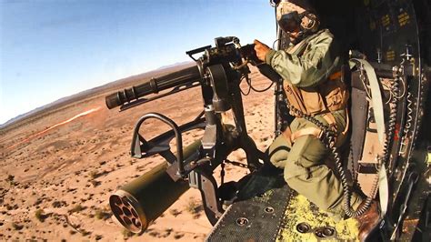 Firing Powerful M134 Minigun Against Simulated Enemy From A Helicopter