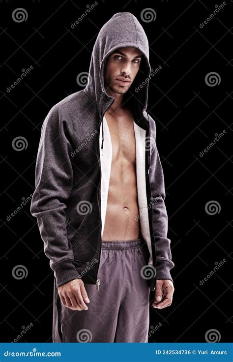Brooding Manliness Studio Shot Of A Brooding Bare Chested Young Man