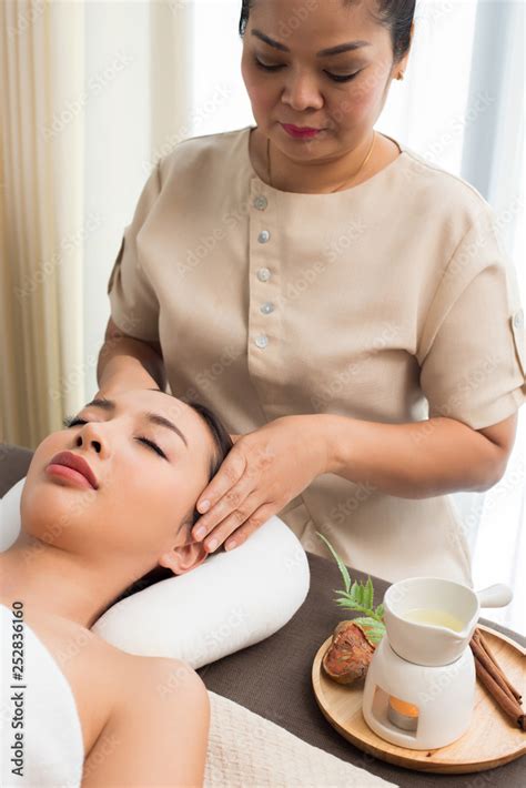 Ayurvedic Head Massage Therapy On Facial Forehead Master Chakra Point Of Mix Race Caucasian