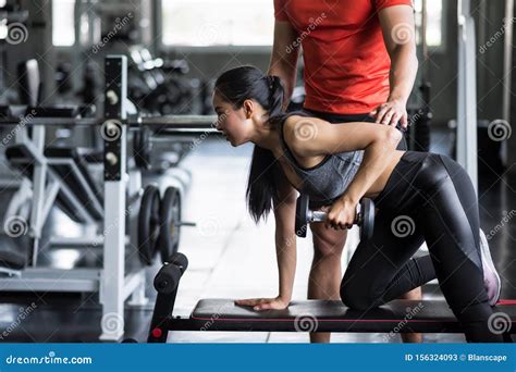 Trainer Coach Dumbbell Exercise To Woman Stock Image Image Of Asian