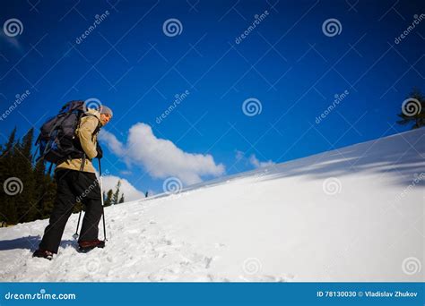 Mountain Climber Walks On A Snowy Slope Stock Photo Image Of Active