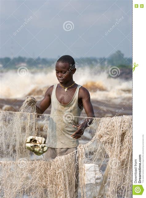 The democratic republic of the congo, often referred to as drc or congo, and formerly as zaire, is the second largest country by area on the african continent and the richest in mineral wealth. Young Men Catch Fish On The Bank Of The River Of Congo ...