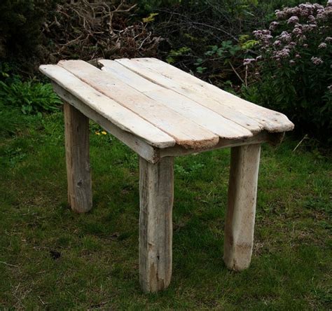 Driftwood tables are made from pieces of driftwood that are sun bleached and formed due to oceanic currents. Driftwood Tables - Coastal - Dining Tables - by Julia's ...