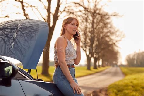 Woman With Broken Down Car On Country Road Calling For Help On Mobile Phone Stock Image Image