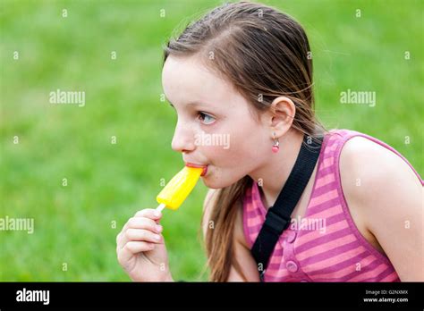 Girl Sucking Popsicle