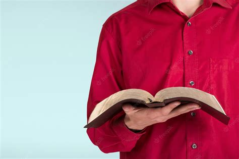 Premium Photo Man Holding Holy Bible Midsection View