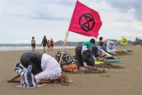 Activists Lose Their Heads At Climate Protest Local Matters