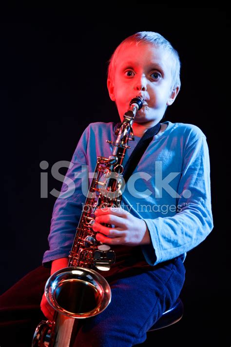 Young Blond Boy Blowing A Mean Sax Solo Stock Photo Royalty Free