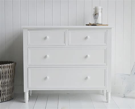 Loaf's simple white chest of drawers with natural wooden handles and heaps of storage space in this coastal bedroom. New England plain white chest of drawers. The White ...