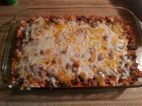 This tasty ground beef nacho cheese doritos casserole is the perfect, quick and easy family dinner for any night of the week! Dorito Casserole 1 bag of Doritos 2 lbs ground beef 1 pkg ...