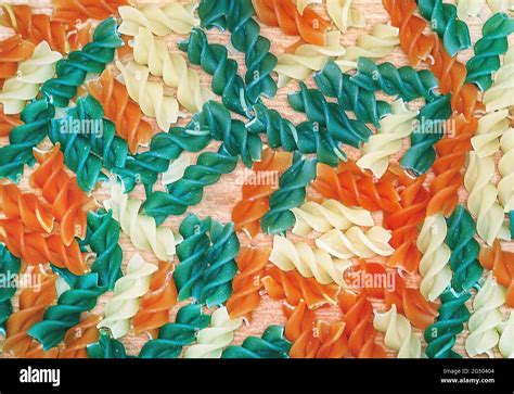 Raw Colorful Sryral Pasta Closeup Background Stock Photo Alamy