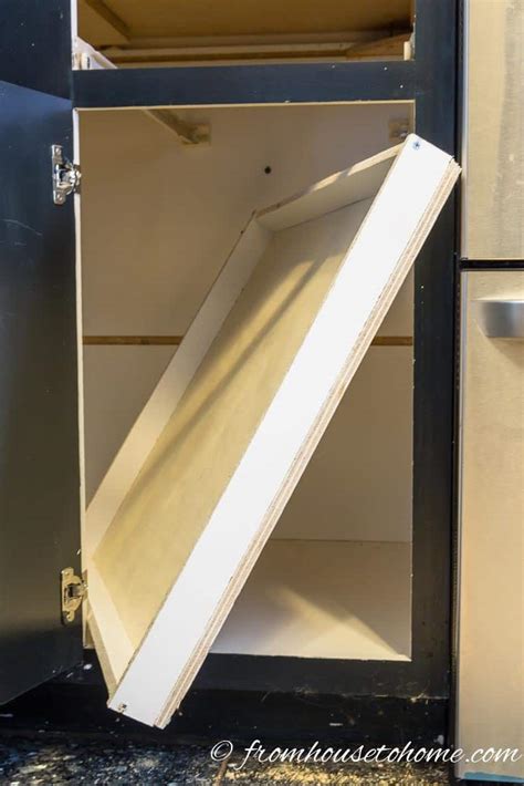 Remove cabinet doors and set aside. How To Build Pull Out Shelves For a Blind Corner Cabinet ...