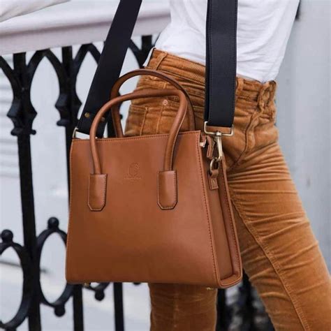 Vear Fashion On Instagram This Classic Satchel Struts A Strong