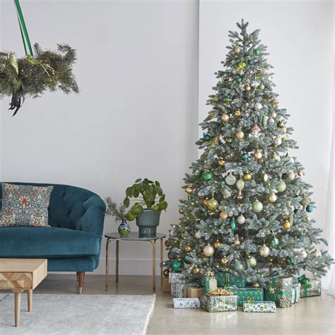 The most common 2019 christmas tree material is metal. See the John Lewis Christmas tree decorating trends 2019