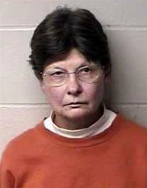 73 year old woman accused of murdering her husband hiding the body charged with larceny