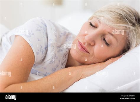 Woman Sleeping With Eyes Closed In Bed Stock Photo Alamy