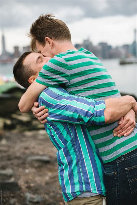 Happy Gay Couple Hugging Outdoors Del Colaborador De Stocksy Simone Wave Stocksy