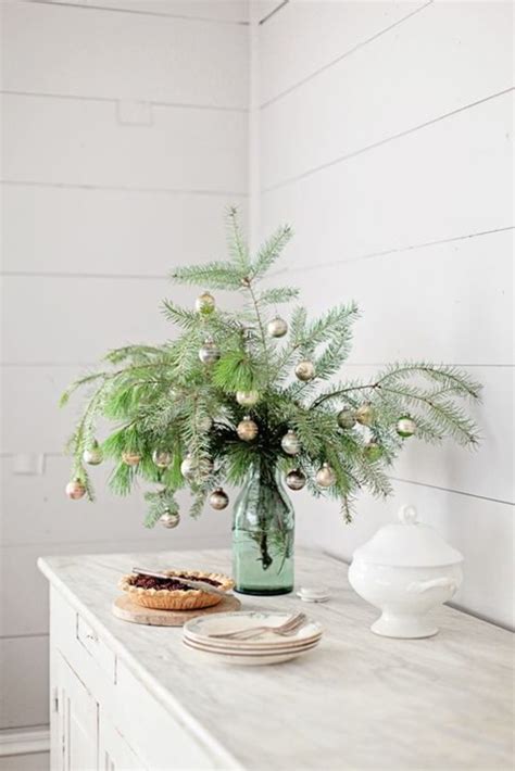 Sapins de noël et décorations. Comment incorporer la branche de sapin dans la décoration?
