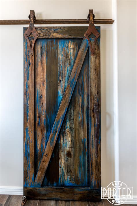 There folding doors harmoniously with stained. Blue Stained Sliding Door | Porter Barn Wood