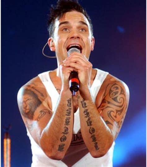 Découvrez Tous Les Tatouages De Robbie Williams