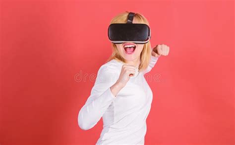 Portrait Of Young Woman Wearing Vr Goggles Experiencing Virtual Reality Using 3d Headset