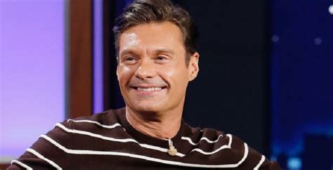 Ryan Seacrest And Girlfriend Exchange Sloppy Kiss On Getaway