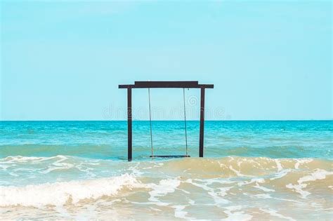Swing In The Sea With An Empty Inscription Board Exotic Tropical