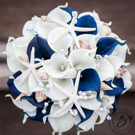Maybe you would like to learn more about one of these? Navy blue nautical bouquet with calla lilies and shells ...