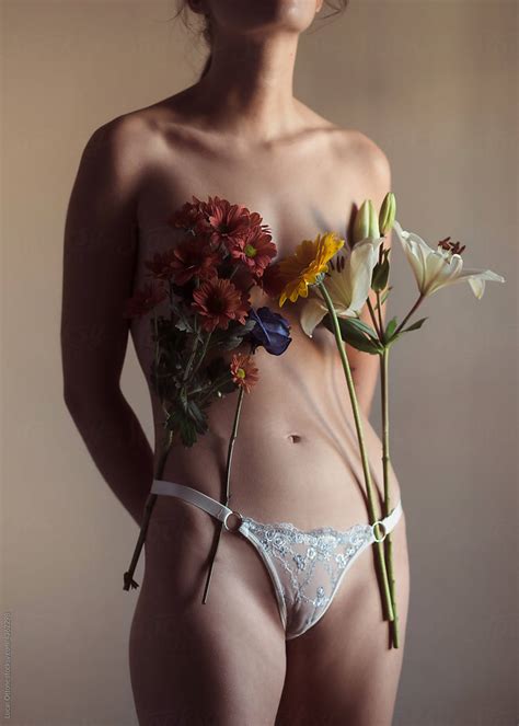 Nude Woman With Flowers By Stocksy Contributor Lucas Ottone Stocksy