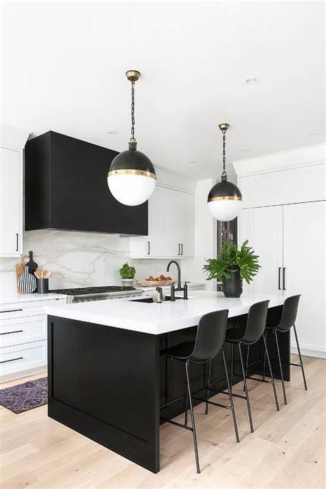 Matte black kitchen island lighting with clear block crystalby design living. Extra Large Hicks Pendants in a modern kitchen above a ...