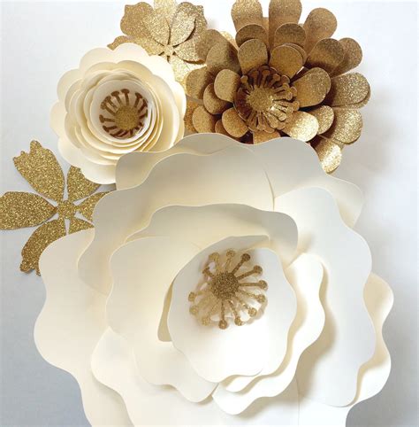 Innovative, patented card holder pocket inside the bag will keep your card (sold separately) front and center; Paper Flower Wedding Reception Wall Ideas | Mid-South Bride