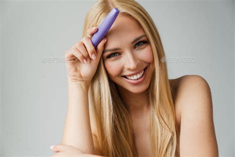 Half Naked Blonde Woman Smiling While Showing Mascara Stock Photo By Vadymvdrobot