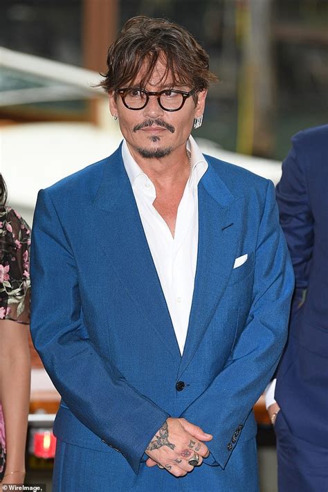 He made his film debut. Johnny Depp dazzles in electric blue suit at the Venice ...