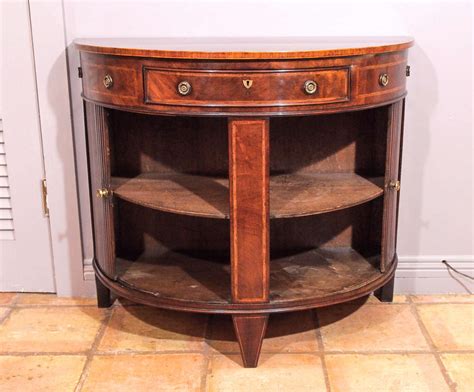 We did not find results for: Antique English Demilune Side Cabinet at 1stdibs