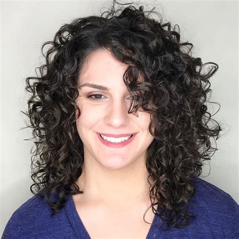 50 Natural Curly Hairstyles And Curly Hair Ideas To Try In 2020 Hair Adviser Layered Curly