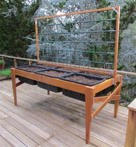 The sloped lid provides rain runoff. 4x8 Raised Garden Bed Plans (Complete Plans, Tool and Supply List)